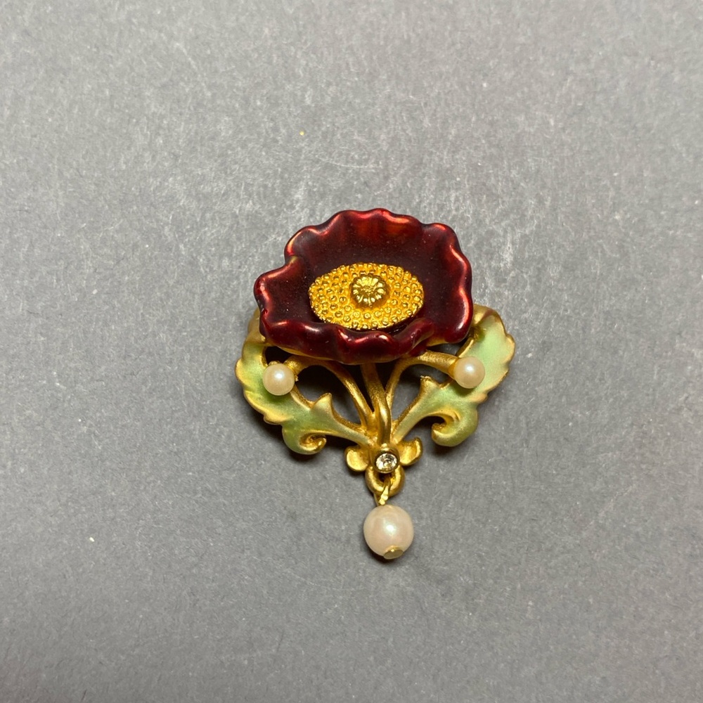 Joan rivers poppy flower pin